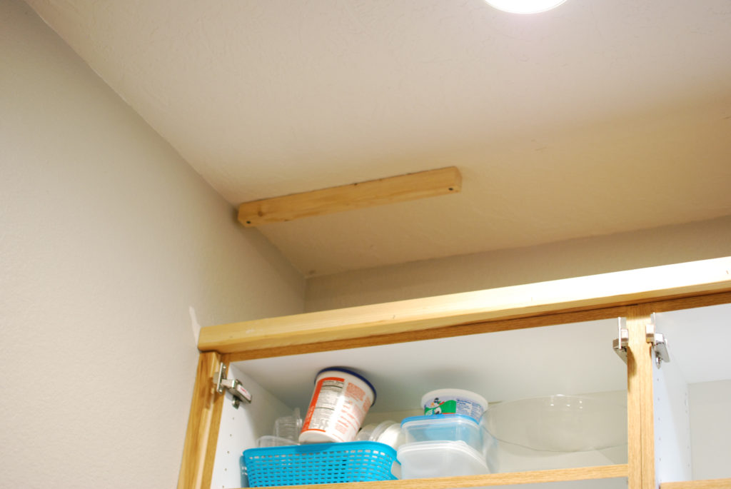 Wood cleat mounted to ceiling