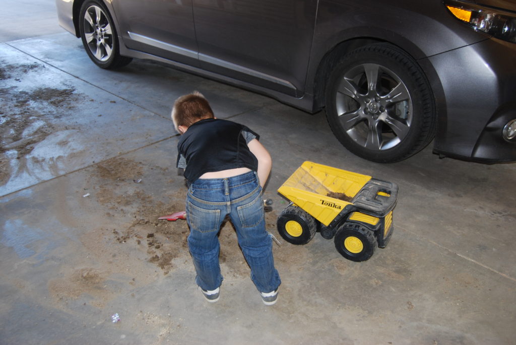Child working in garage