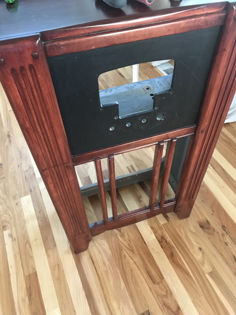 Before picture of vintage radio cabinet